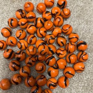 set of 5 bengal tiger mega glass marbles. Orange , black